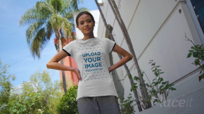 Video of a Woman Pointing at Her t-Shirt in an Urban Scenario 3385v