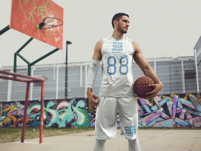 Basketball Jersey Maker - Young Tall Man with Basketball in an Urban Court