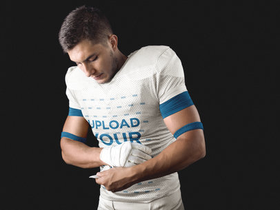 Custom Football Jersey Maker - Man Putting Gloves On