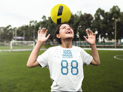 Custom Soccer Jerseys - Girl Holding a Ball on her Head