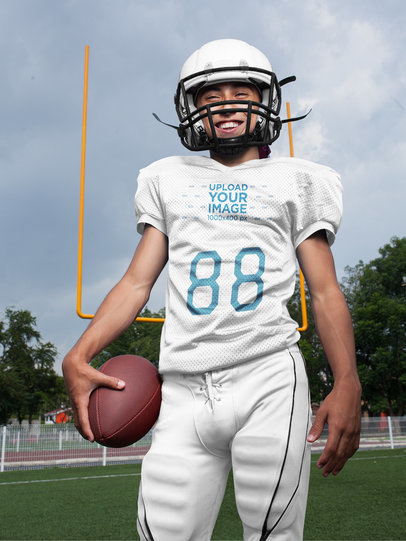 Custom Football Jerseys - Happy Dude with the Ball at the Field