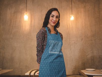 Woman Wearing an Apron Mockup at a Restaurant