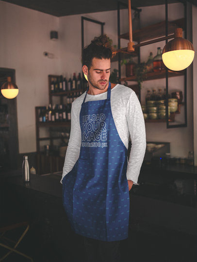Bartender Wearing an Apron Mockup at the Bar