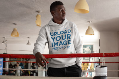 Hoodie Mockup Featuring a Man on a Box Ring