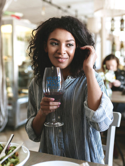 Mockup of a Woman Drinking from a Wine Glass at a Restaurant 36578-r-el2