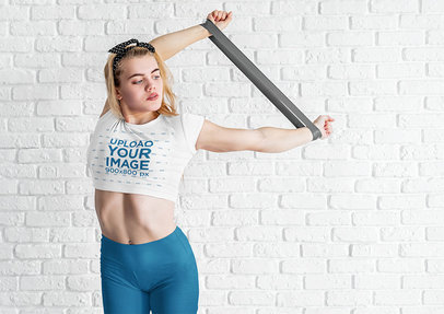 Crop Top Mockup of a Woman Training With a Resistance Band m3382-r-el2